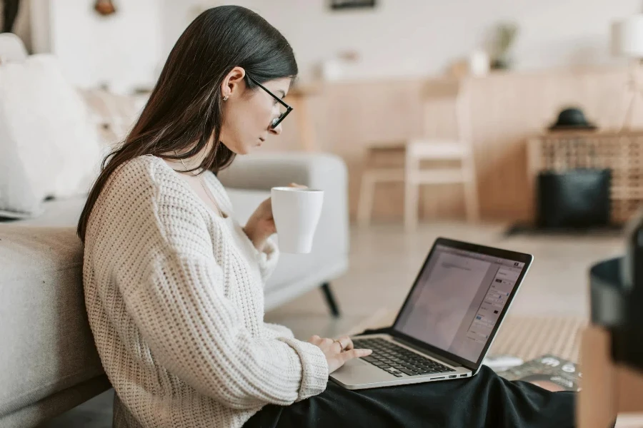 female freelancer in warm sweater