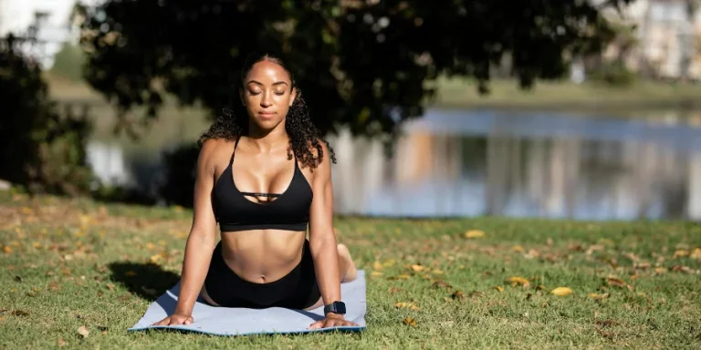 Woman in Black Sports Bra Doing Yoga
