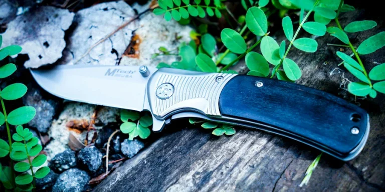 Photography of Knife Near Leaves