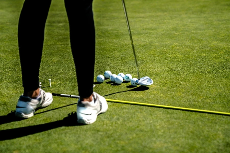 Woman Holding Golf Driver