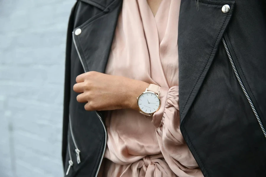 Woman Wearing Peach Dress and Black Jacket