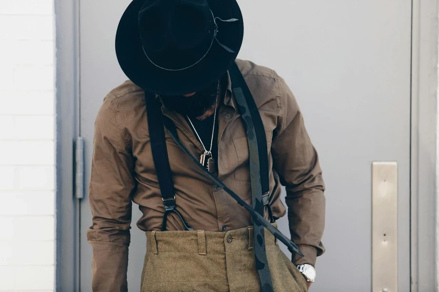 Person Wearing Brown Dress Shirt