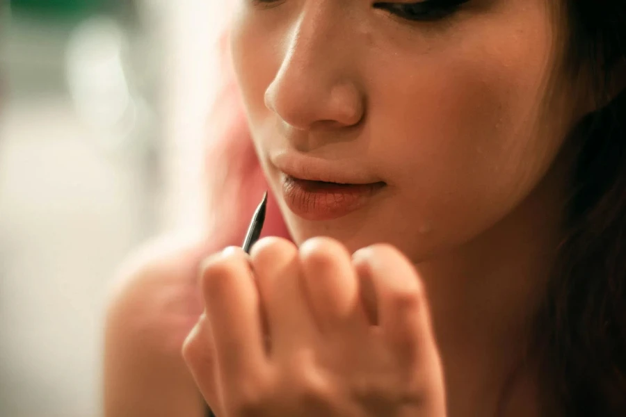 Shot of Person Holding a Lip Liner