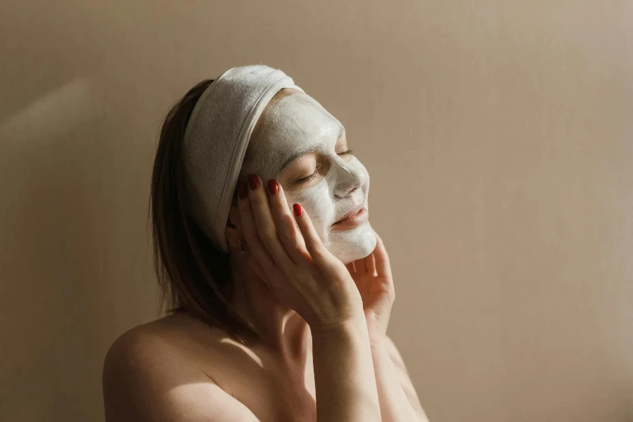 A Woman with a White Facial Mask