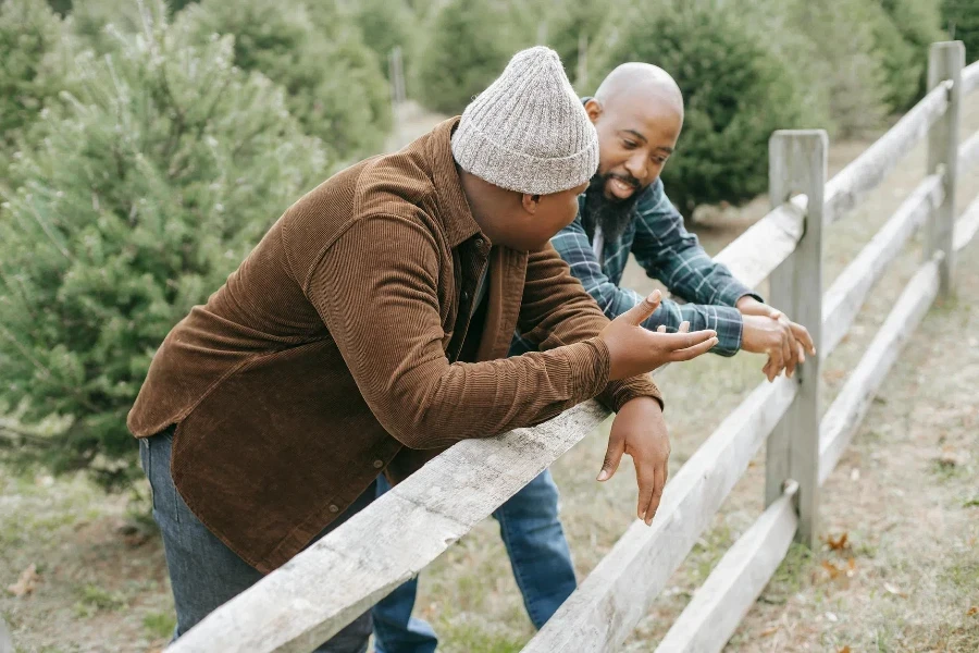 Black father talking to unrecognizable son