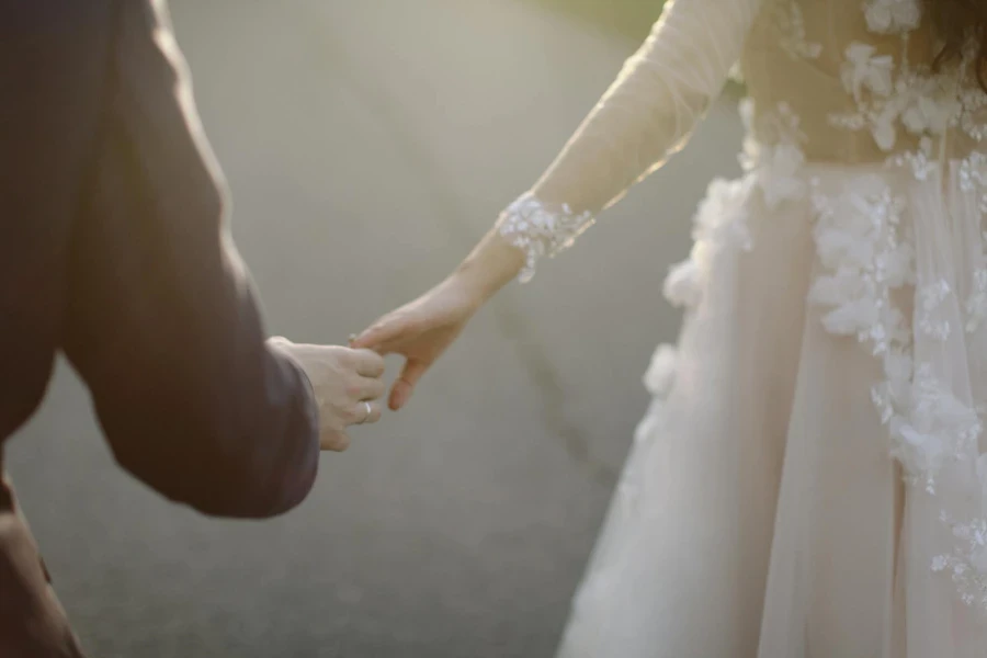 Newlyweds Holding Hands