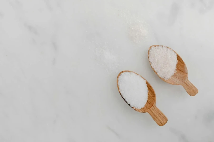 A Pair of Wooden Spoons with Sugar