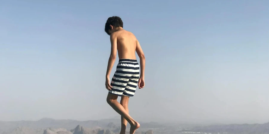 Boy in Swimming Trunks