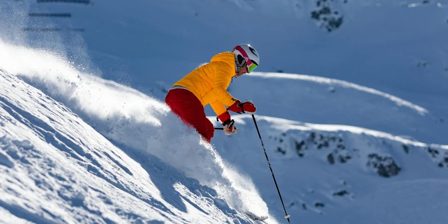 A Person Skiing on a Snow Capped Mountain