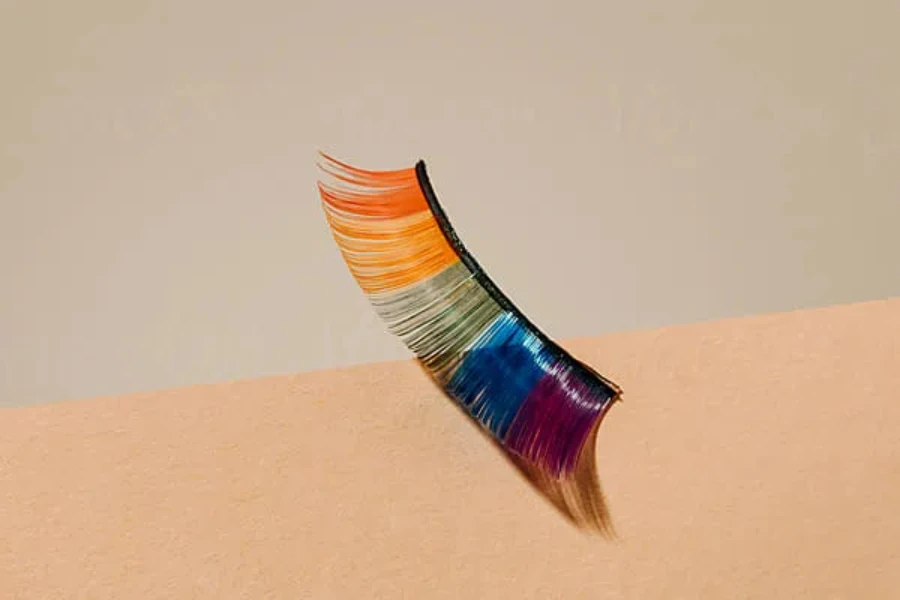 rainbow fake eyelash on a beige background