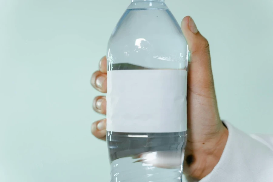 A Person Holding a Water Bottle