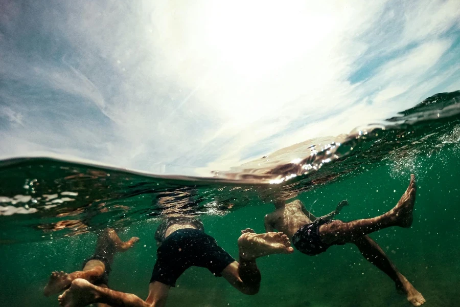 People Swimming in Water