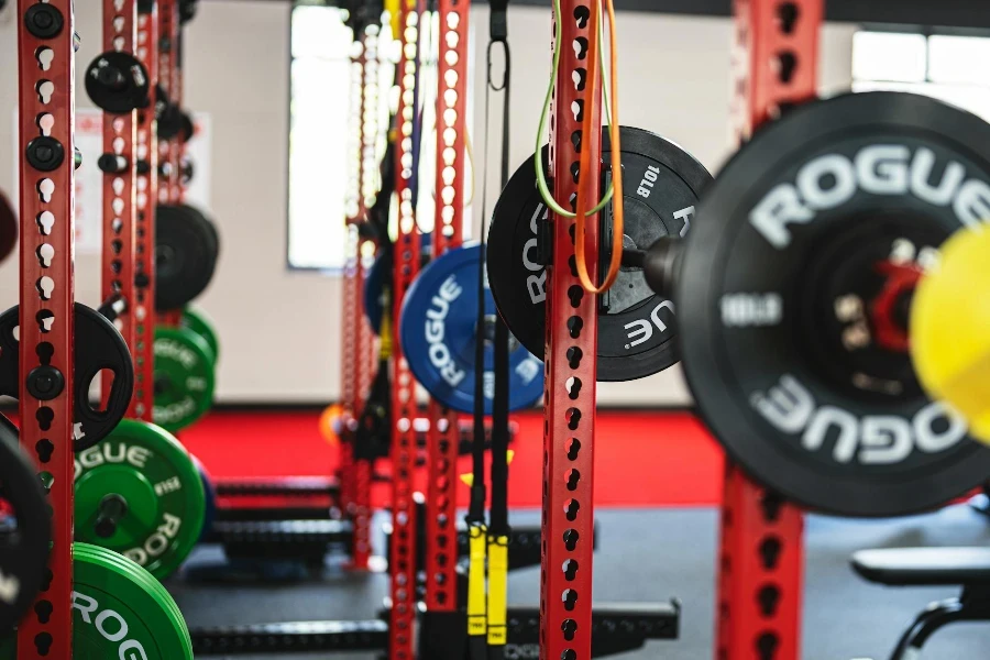 A gym with a variety of weights and equipment