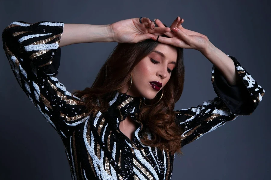 Brunette Woman Posing with Her Arms Raised