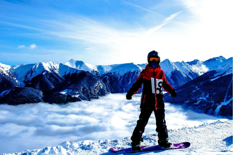 Snowboarded on Snow Covered Mountain