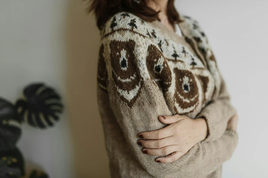 Woman Wearing a Knitted Sweater