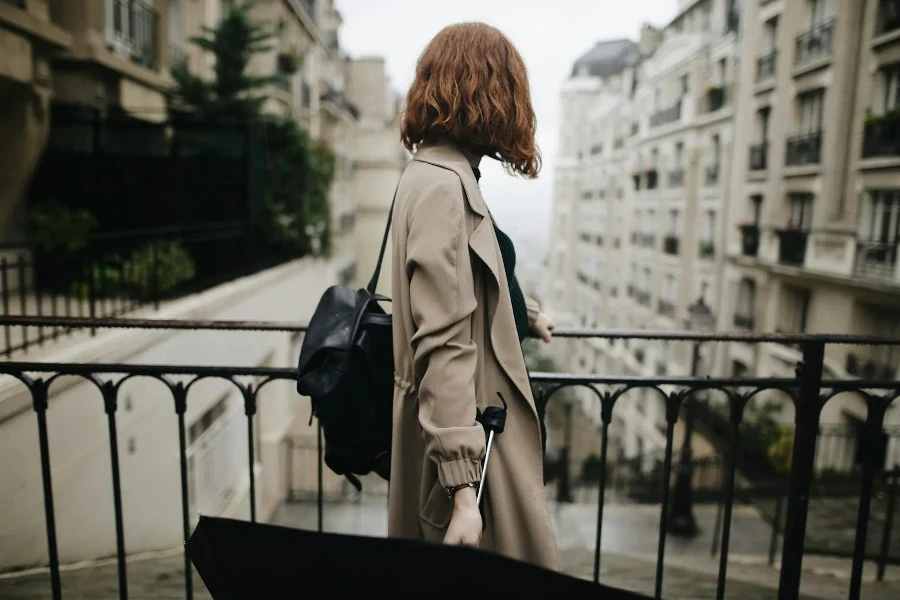 Woman Beside Fence