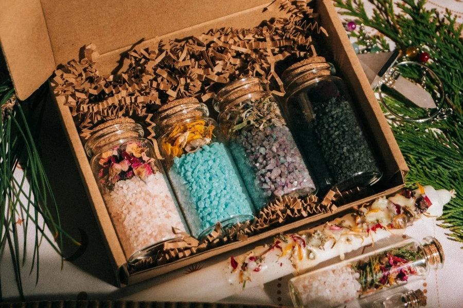 Jars of bath salt with dried herbs