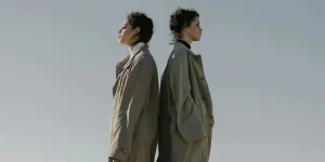 Man in Brown Coat Standing