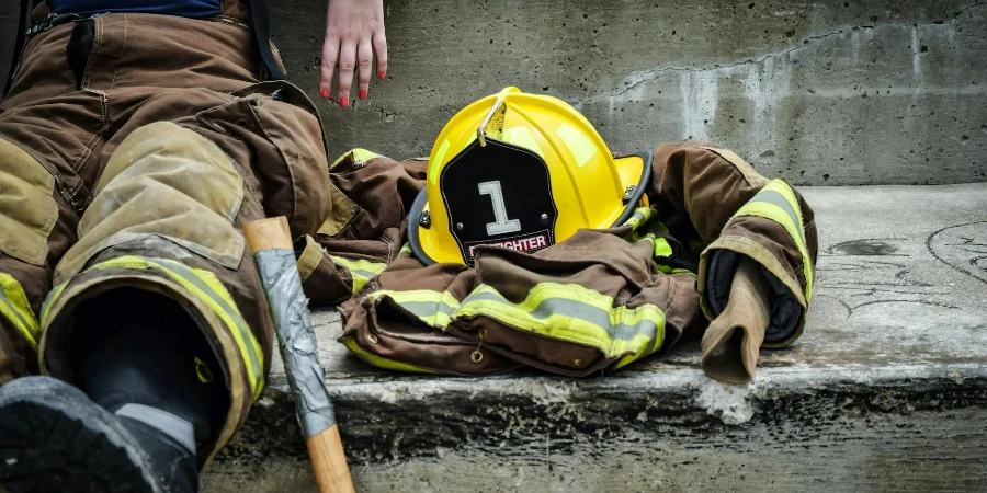 Yellow Hard Hat on Brown and Yellow Fireman's Suit