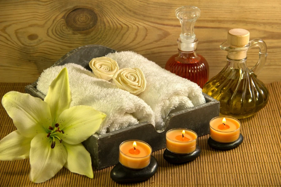 Luxury bath towels in a tray ready for aromatherapy