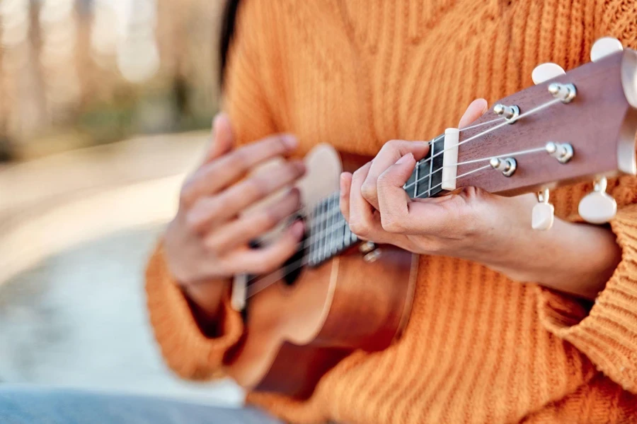 playing ukulele in the garden