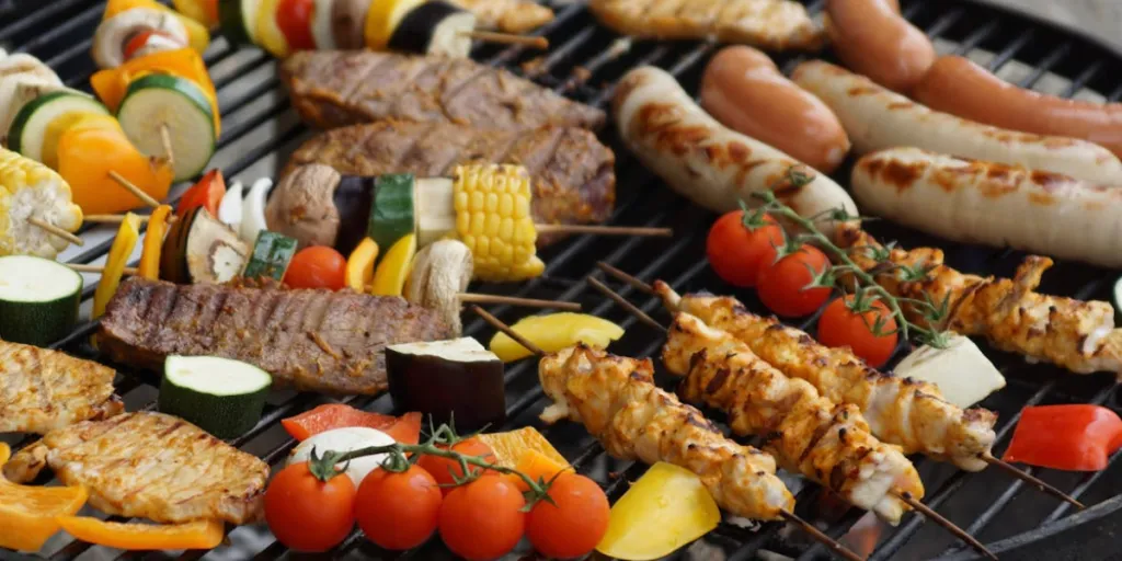 Selection of BBQ foods on a grill