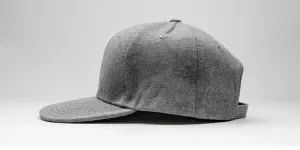 side view of plain grey snapback hat