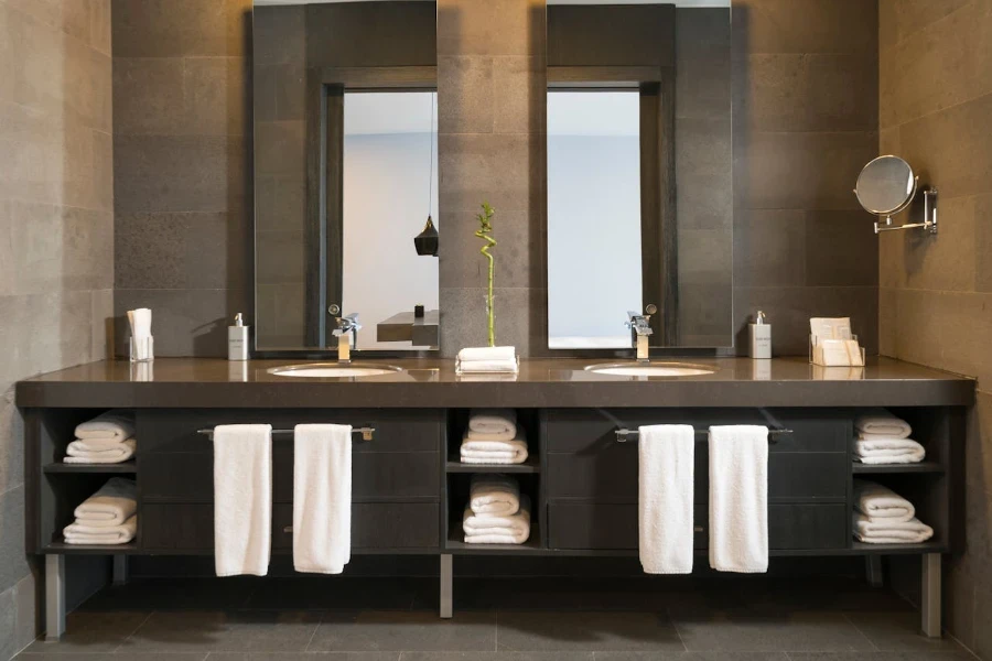 White bath towels arranged in a bathroom