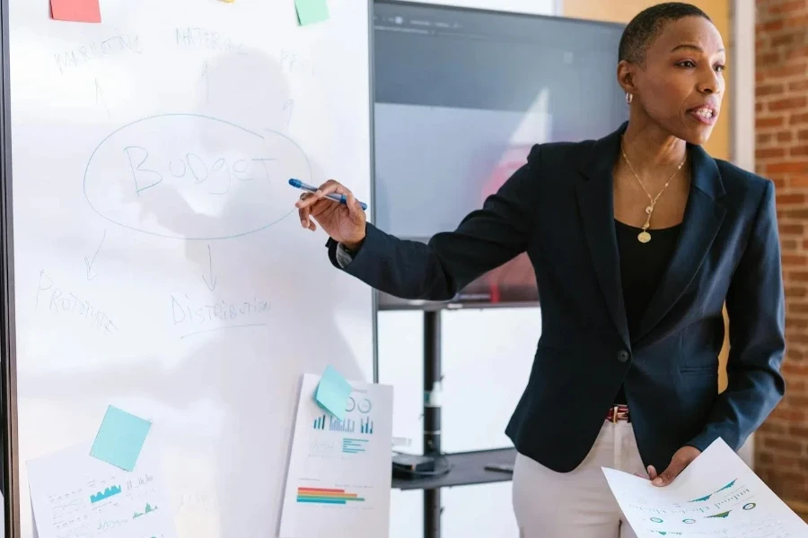 Woman giving her business pitch to an audience