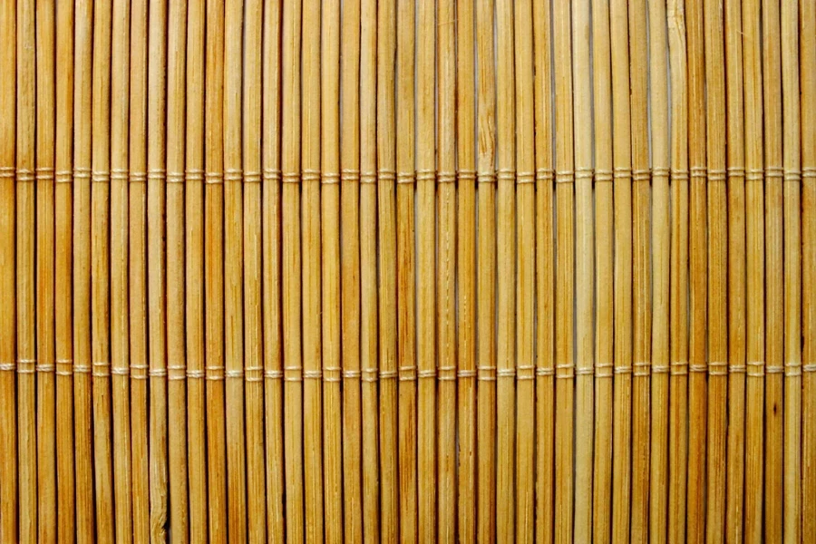 A Bamboo Mat With Numerous Bamboo Sticks, Creating a Natural and Textured Backdrop 