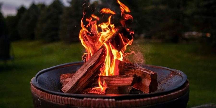 A Pot on a Table With a Burning Fire Inside