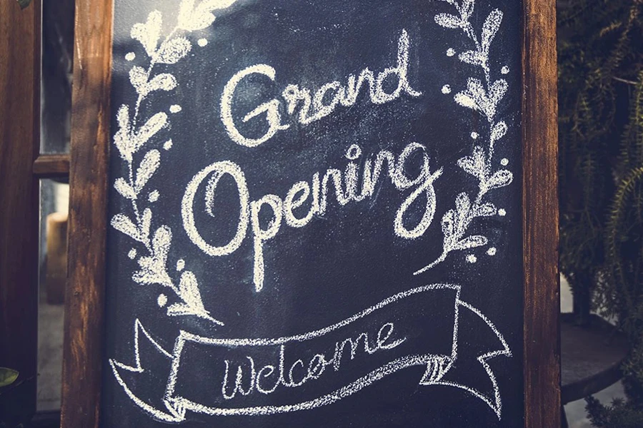 A beautifully designed grand opening sign