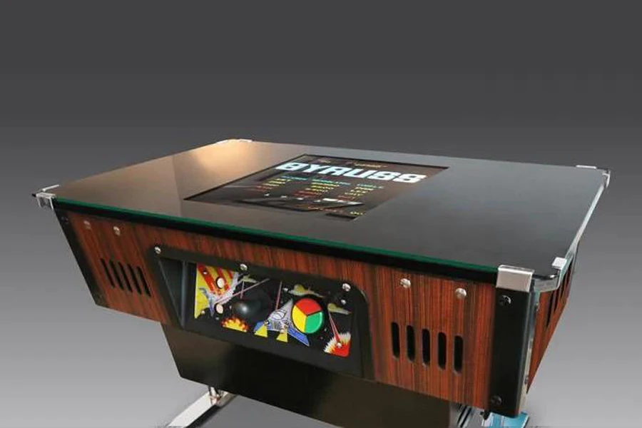 A cocktail table arcade machine on a grey background