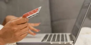 A person doing online shopping on their laptop