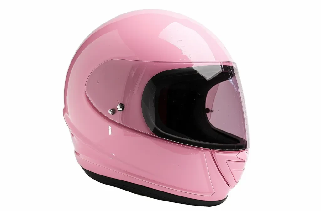 A pink motorcycle helmet with clear visor