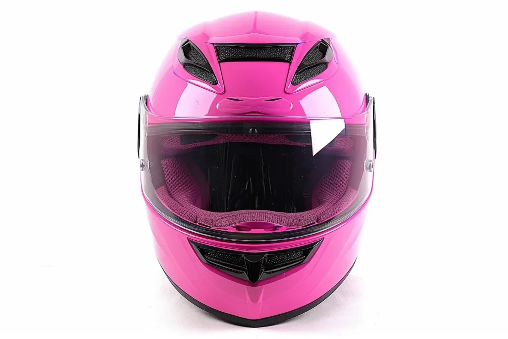 A pink motorcycle helmet