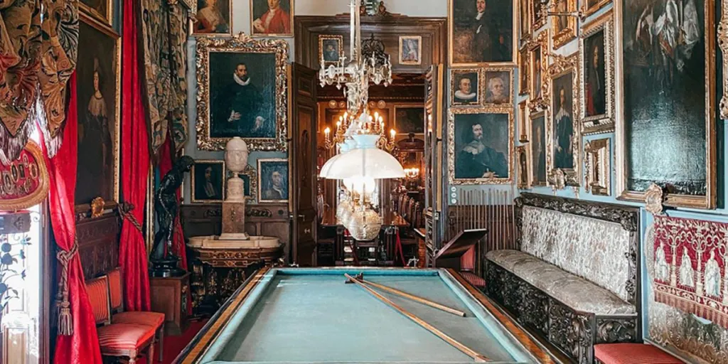 A snooker & billiard board in a decorated room