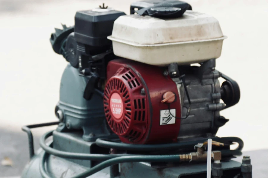 An Empty Plastic Cup Standing next to a Compressor Unit