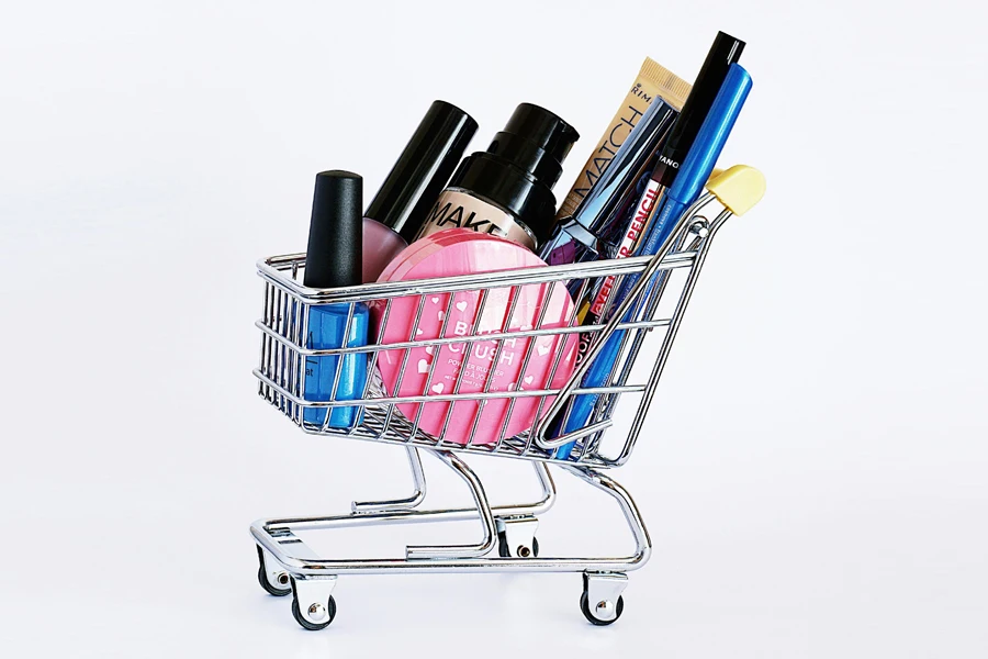 Assorted cosmetics in a shopping cart