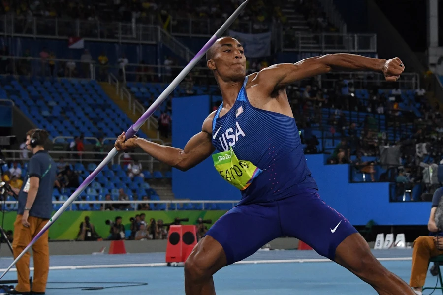Athlete on the field poised to throw a javelin
