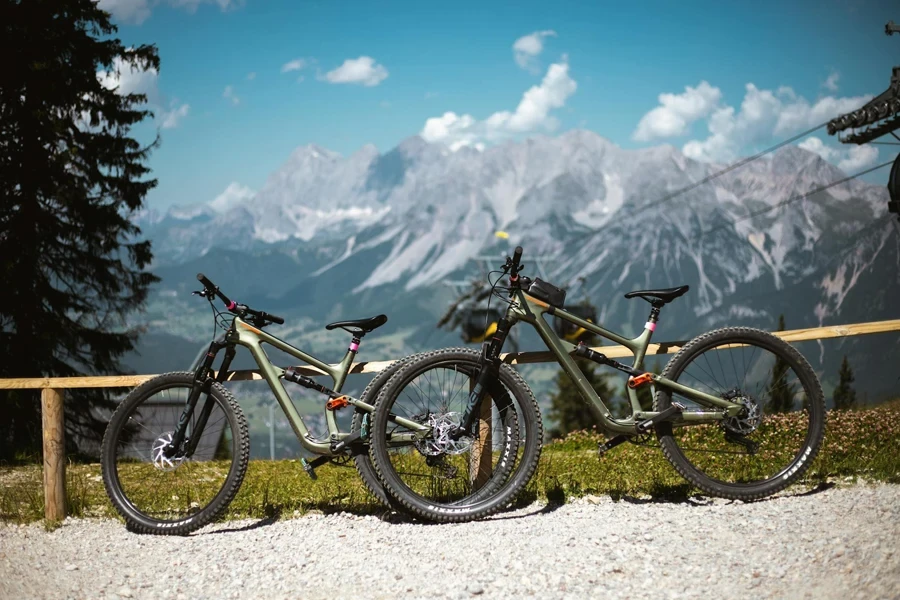 Bicycles Parked beside the Wooden Fence