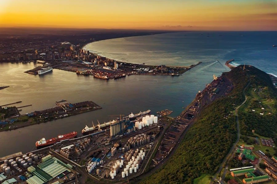 Birds eye view of a major port and clear blue ocean