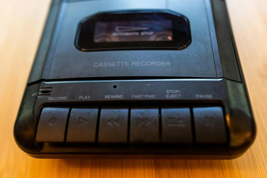 Black Cassette Player on Wooden Surface