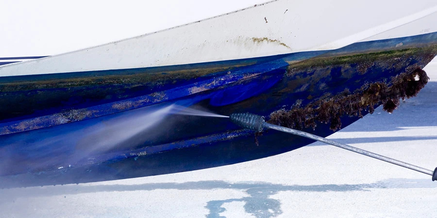 Boat hull cleaning water pressure washer barnacles antifouling and seaweed.jpg