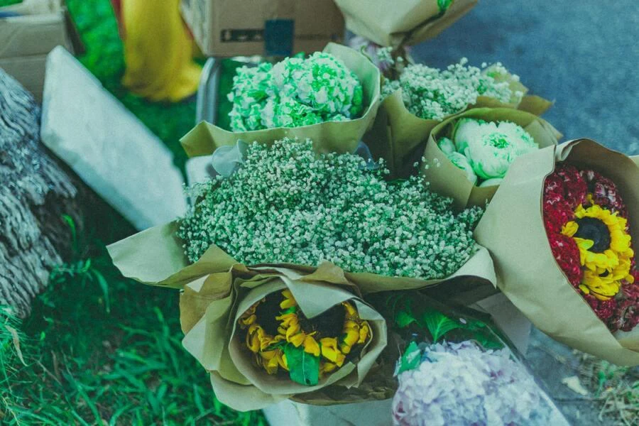 Bouquets of flowers wrapped in paper packaging