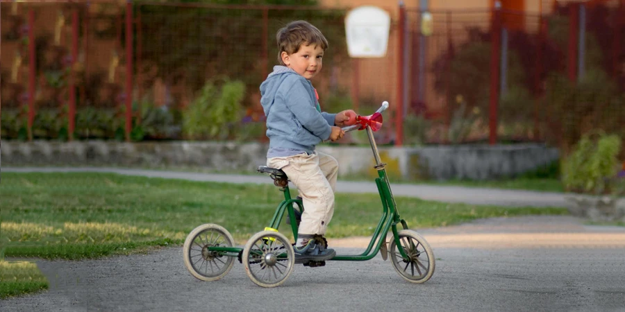 Boy Riding Green bike