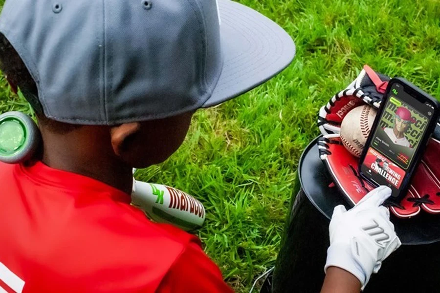 Boy getting feedback from smart bat