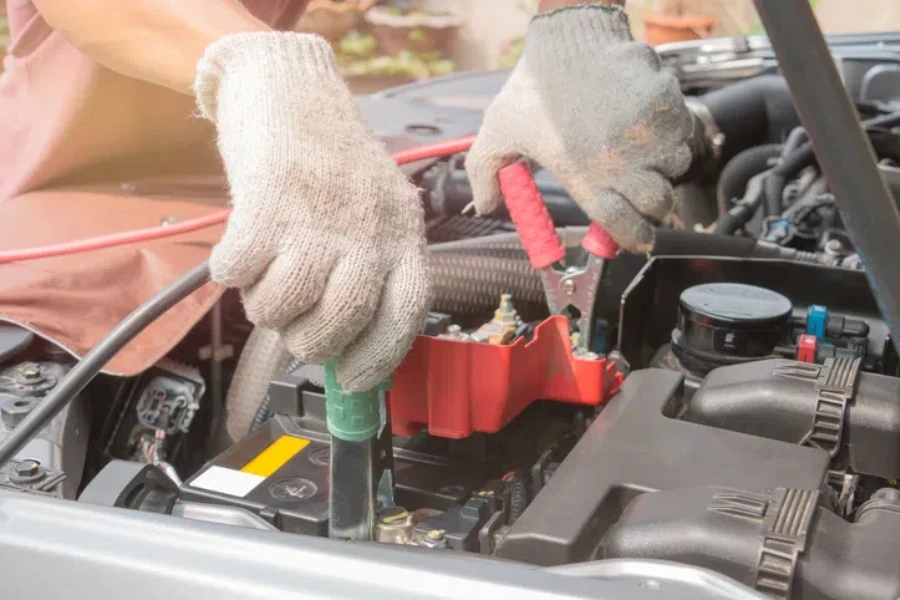 Charging battery car with electricity trough jumper cables