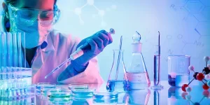 Chemistry Laboratory - Woman With Pipettes And Test Tubes